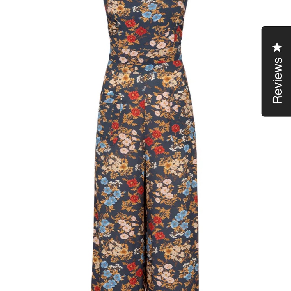 Romper- never worn! Needed a bigger size.